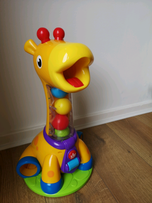 bright starts having a ball spin & giggle giraffe